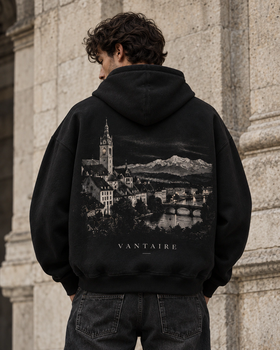 Hoodie 001 worn from the back, showing its European city artwork